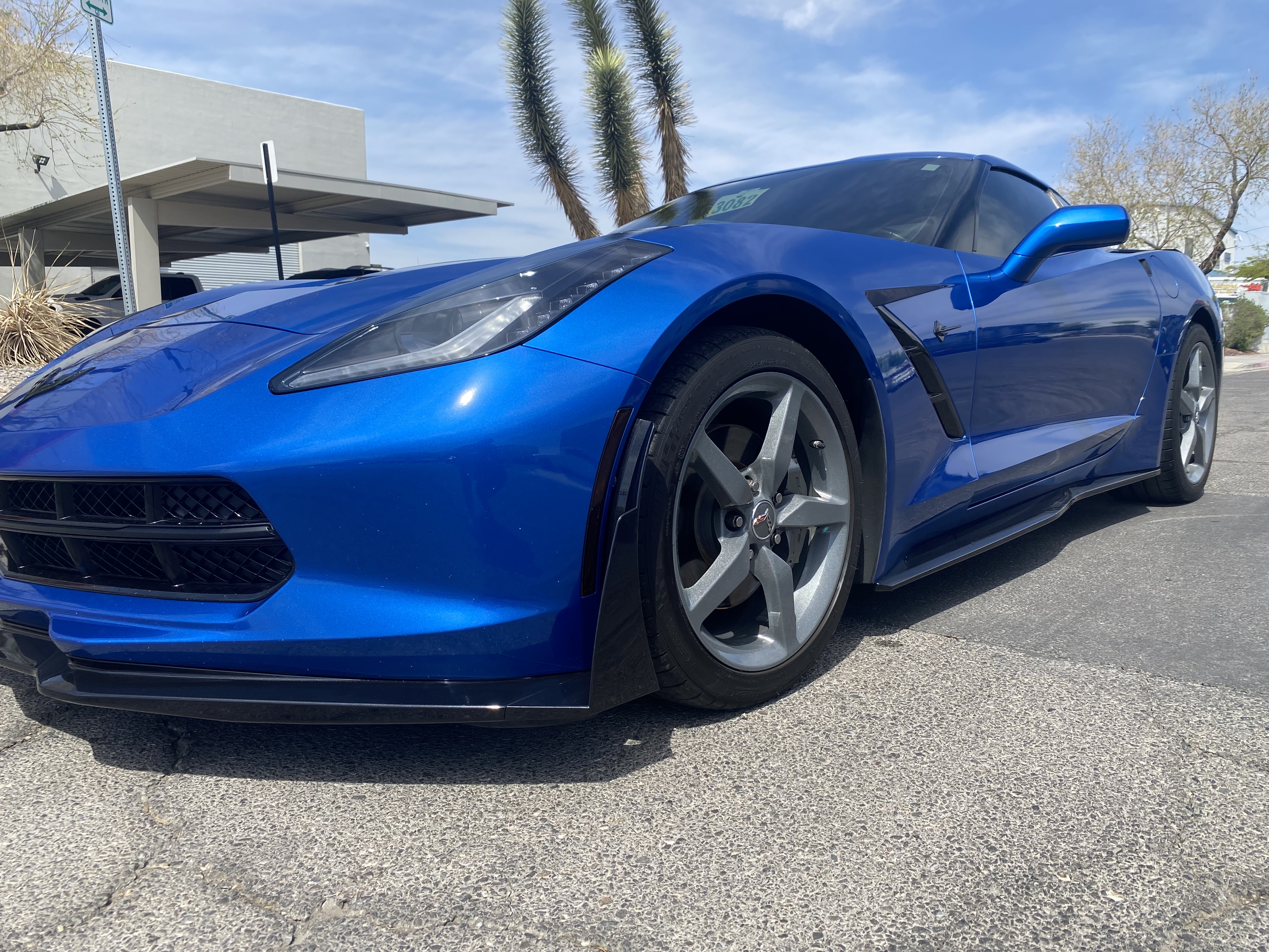 Corvette custom paint job with lip splitter and side skirts at Spray Gun Autobody Las Vegas