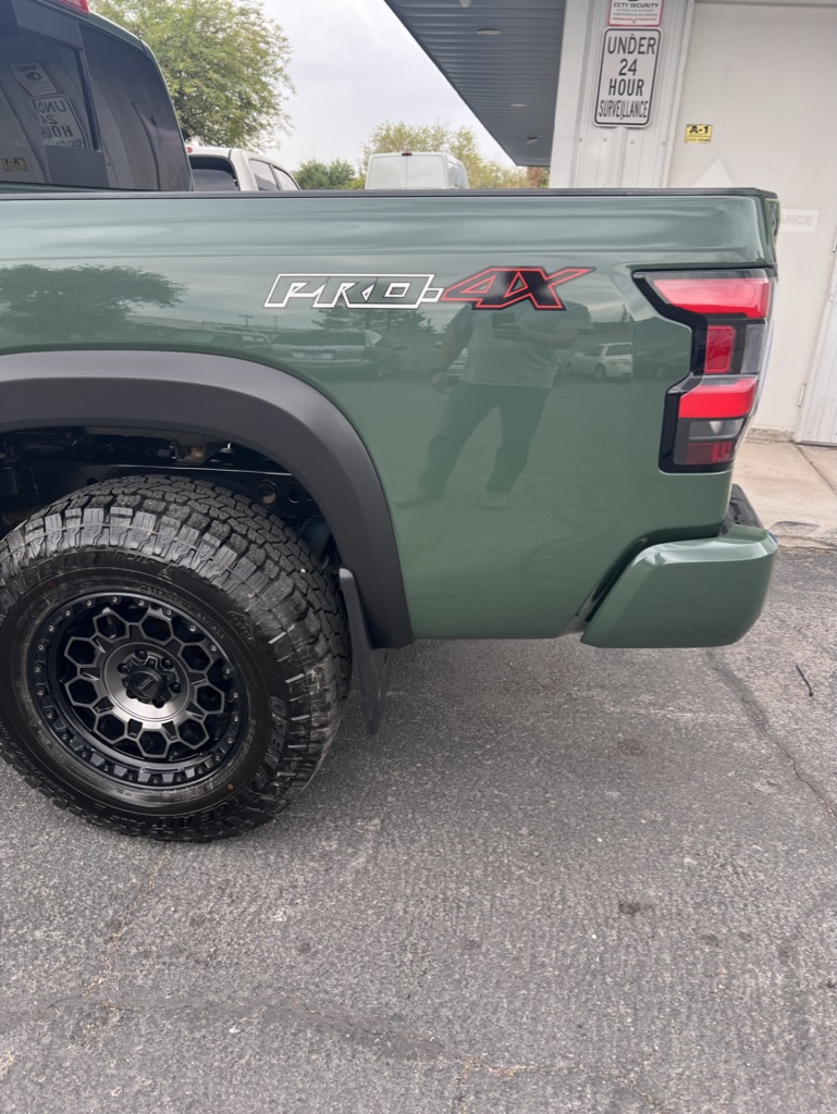 Nissan Frontier Pro-4X paintless dent repair at Spray Gun Autobody Las Vegas