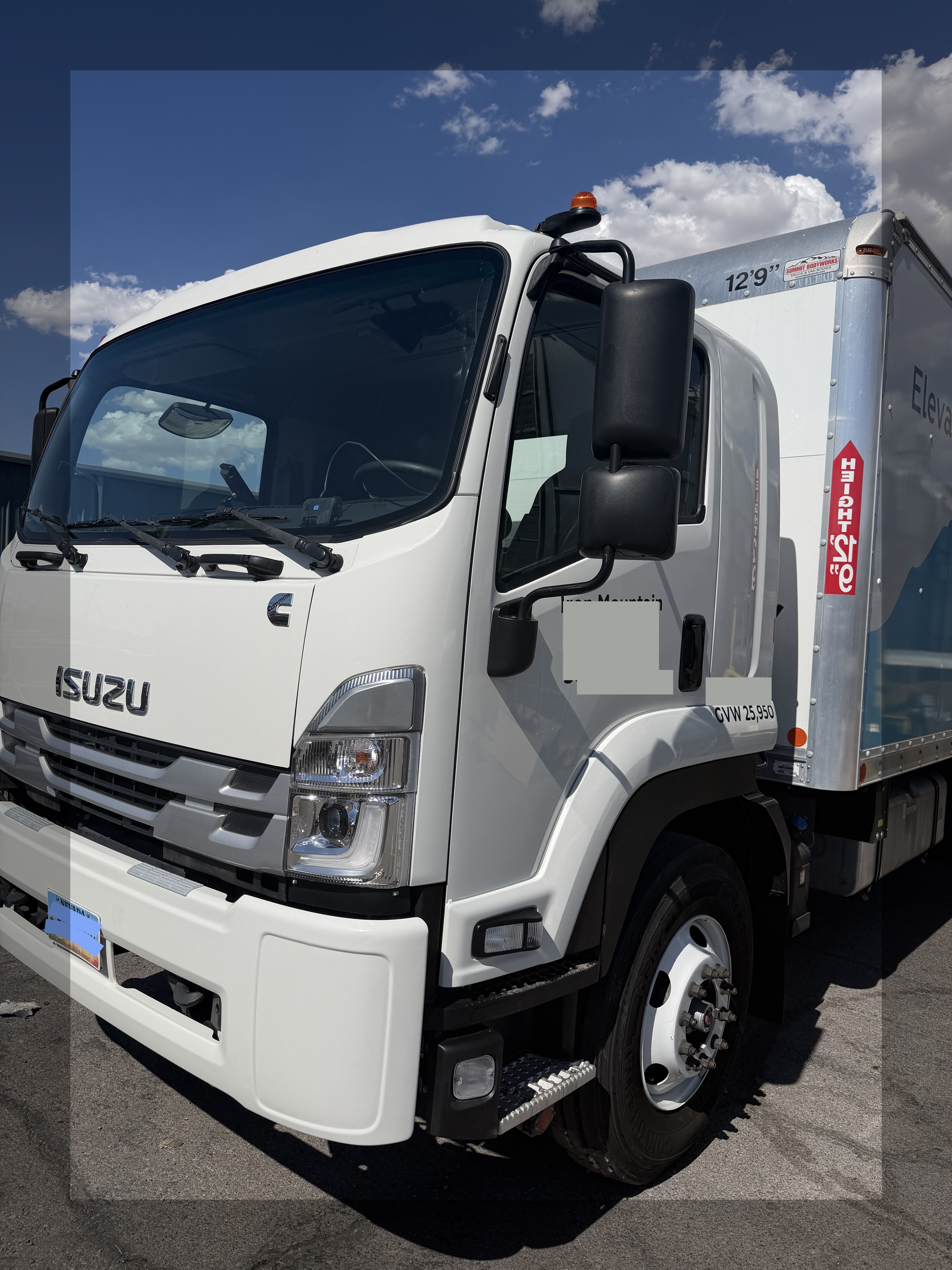 Completed 2024 Isuzu FTR HD after structural collision repair and refinishing at The Spray Gun Autobody