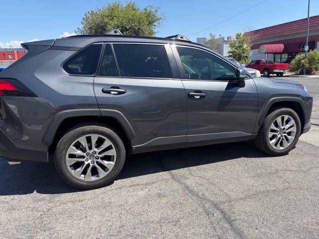 Grey Toyota RAV4 after door repair and paint refinishing at The Spray Gun Autobody in Las Vegas